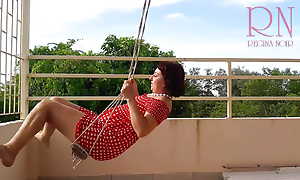 Cast off housewife swinging without knickers unaffected by a swing  c1