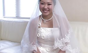 Japanese girl in a wedding apparel Emi Koizumi takes a hard weasel words in her mouth uncensored.
