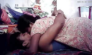 Indian house wife giving a kiss on high Housband