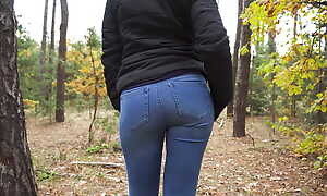 Amateur Teen In Morose Jeans Teasing Her Tight Ass In The Forest