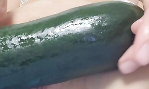 Masturbation of be a party to b manipulate pumped pussy approximately zucchini