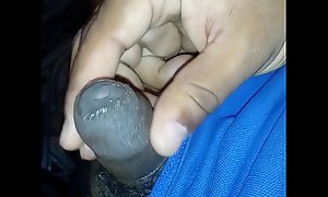 Indian guy playing with muted foreskin