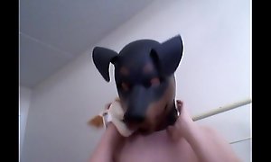 Kinky Girl gets off crippling a rubber dog veil
